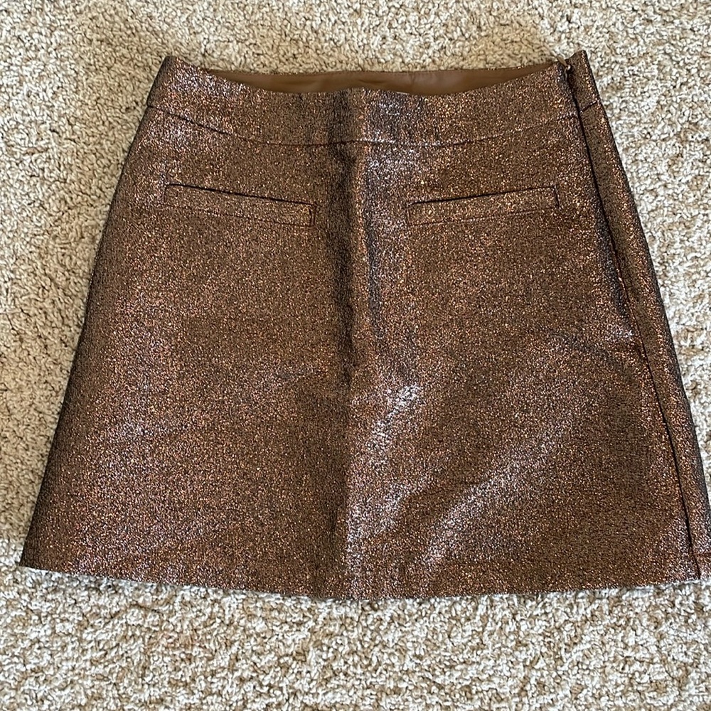 Gap gold skirt with lined shorts and side zipper.  Worn once